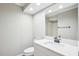 Bathroom with a white vanity and a large mirror at 5017 Pine Cone Dr, Durham, NC 27707