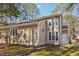 Exterior view of a two-story home with ample windows and detailed siding at 5017 Pine Cone Dr, Durham, NC 27707