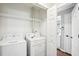 Convenient laundry room with washer, dryer and shelving at 5017 Pine Cone Dr, Durham, NC 27707