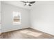 Bedroom featuring a ceiling fan, wood-look flooring, and ample natural light at 603 Lee St, Burlington, NC 27217