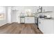 Modern kitchen featuring stainless steel appliances, granite countertops, and ample cabinet space at 603 Lee St, Burlington, NC 27217