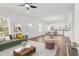 Inviting living room with wood floors, bright windows, modern furniture, and a cozy atmosphere at 603 Lee St, Burlington, NC 27217