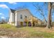Back of home with a wooden deck and siding at 605 Lee St, Burlington, NC 27215