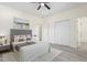 Comfortable bedroom with a plush bed, soft lighting, and spacious closets for ample storage at 605 Lee St, Burlington, NC 27215