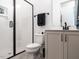 Bathroom boasts a white subway tiled shower, vanity with sink, and modern fixtures at 696 The Parks Dr, Pittsboro, NC 27312