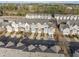 This is an aerial view of the townhome community with beautiful landscaping and ample parking at 711 Keystone Park Dr # 51, Morrisville, NC 27560