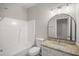 Bathroom features a shower/tub combo, granite counters, tile flooring, toilet, and a vanity at 711 Keystone Park Dr # 51, Morrisville, NC 27560