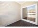 Wood deck with sliding glass door and vinyl siding at 711 Keystone Park Dr # 51, Morrisville, NC 27560
