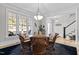 Bright dining room with large windows, perfect for Gathering gatherings at 818 Cabin Creek, Pittsboro, NC 27312