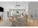 Bright and airy living room with large windows and comfortable seating area at 818 Cabin Creek, Pittsboro, NC 27312