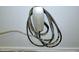 Close up shot of wall mounted Tesla electric car charger at 905 Maynard Creek Ct, Cary, NC 27513