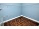 Walk-in closet features laminate floor and wire shelving for organization at 905 Maynard Creek Ct, Cary, NC 27513