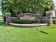 Stone sign with the community name, 'Maynard Creek' surrounded by manicured landscaping at 905 Maynard Creek Ct, Cary, NC 27513