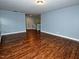 Spacious living room with beautiful flooring and soothing wall color at 905 Maynard Creek Ct, Cary, NC 27513
