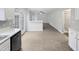 This kitchen overlooks an open layout into the living room and entryway at 1009 Bittbourg Ln, Wendell, NC 27591