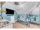 Bright workout space with a TV, modern equipment, and sink for a perfect blend of fitness and convenience at 1100 Kingwood Dr, Raleigh, NC 27609