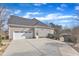 Spacious home with three car garage and large driveway at 1100 Kingwood Dr, Raleigh, NC 27609