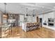 Spacious kitchen with a large central island, hardwood floors, and a stainless steel appliance package at 1100 Kingwood Dr, Raleigh, NC 27609