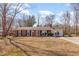 Charming single-story brick home with a well-manicured front yard at 114 Evelyn Dr, Knightdale, NC 27545