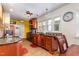 A kitchen with wooden cabinetry, black granite countertops, and tiled backsplash at 114 Evelyn Dr, Knightdale, NC 27545