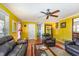 Open living room with hardwood floors and adjacent dining area at 114 Evelyn Dr, Knightdale, NC 27545