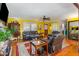 Inviting living room with leather furniture, hardwood floors, and open layout at 114 Evelyn Dr, Knightdale, NC 27545