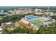 An aerial shot showcases the University of North Carolina's stadium and campus set among lush greenery and city buildings at 120 Weavers Grove Dr, Chapel Hill, NC 27514