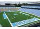 The University of North Carolina's football field is marked with 'Tar Heels' in bright blue against a field of vibrant green at 120 Weavers Grove Dr, Chapel Hill, NC 27514