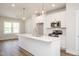 Modern kitchen featuring stainless appliances, large island, and pendant lighting at 120 Weavers Grove Dr, Chapel Hill, NC 27514