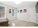 Neutral bedroom with carpet, natural light from the window, and sports memorabilia at 140 Big Barn Dr, Wendell, NC 27591