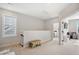Bonus room with a window, a blue table and a view of kitchen at 140 Big Barn Dr, Wendell, NC 27591