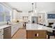 Bright and airy kitchen features white cabinetry, stainless steel appliances, and a functional layout at 140 Big Barn Dr, Wendell, NC 27591