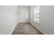 Welcoming entryway with a light-filled ambiance showcasing a bright window and elegant flooring at 156 Fideaux Blvd # 248, Raleigh, NC 27603