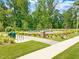 Outdoor fitness area with exercise equipment, walking paths, and landscaped surroundings for an active lifestyle at 156 Fideaux Blvd # 248, Raleigh, NC 27603