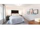 Cozy bedroom featuring carpet, neutral paint, and a queen bed at 2019 Cherry Creek Rd, Haw River, NC 27258