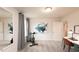 The exercise room has an exercise bike, carpet, and neutral paint at 2019 Cherry Creek Rd, Haw River, NC 27258