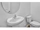 Bathroom featuring a pedestal sink, a toilet, and neutral wall color at 2241 Horton Park Dr, Apex, NC 27539