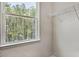 Walk-in closet featuring a window with a view of the tall trees at 2241 Horton Park Dr, Apex, NC 27539