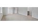 Main bedroom featuring carpet, an ensuite bathroom, and walk-in closet at 2241 Horton Park Dr, Apex, NC 27539