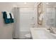 Full bathroom featuring a tub, shower, and modern fixtures at 246 Holton St, Smithfield, NC 27577