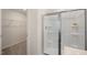 Bathroom showing glass shower and walk in closet at 248 Oak Barrel St, Smithfield, NC 27577