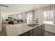 Open concept kitchen showcasing granite countertops and seamless flow into the living area at 248 Oak Barrel St, Smithfield, NC 27577