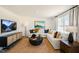 Inviting living room with a large sectional sofa, entertainment center, and stylish decor at 248 Oak Barrel St, Smithfield, NC 27577