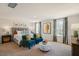 Spacious main bedroom with seating area, large windows and neutral décor at 248 Oak Barrel St, Smithfield, NC 27577