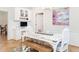 Charming dining area with rustic table, built-in cabinets, and stylish decor at 2511 Pineway Dr, Burlington, NC 27215