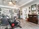 Home gym featuring stationary bike, elliptical, and weight training equipment at 2511 Pineway Dr, Burlington, NC 27215