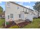 Backyard of townhouse with small patio and lawn area at 3349 Tarleton W, Durham, NC 27713