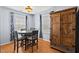 Inviting dining area featuring a round table, and a rustic wooden armoire at 3349 Tarleton W, Durham, NC 27713