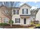 Charming two-story home with classic shutters and well-maintained front yard landscaping at 3349 Tarleton W, Durham, NC 27713