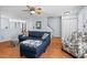 Comfortable living room with an open layout connecting to the dining area and staircase at 3349 Tarleton W, Durham, NC 27713